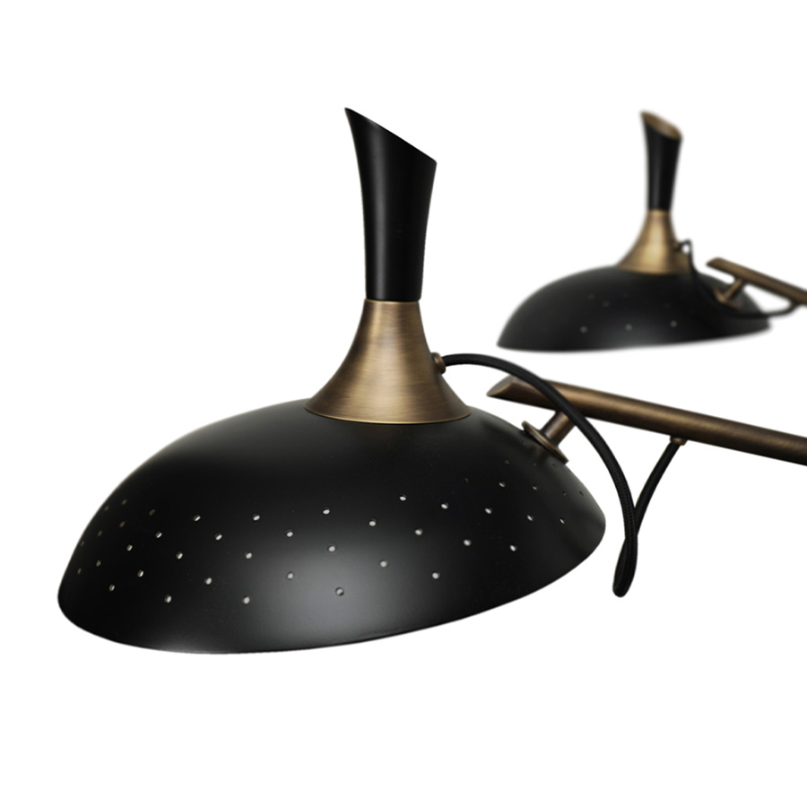 Inspired by the enigmatic life of Abbey Lincoln, this majestic pendant light will be the right lighting design choice for a dramatic dining room. A memorable piece that counts with golden finishes and black matte to give it a twist. This luxurious modern pendant lamp will be giving life and a statement to your modern home decor.