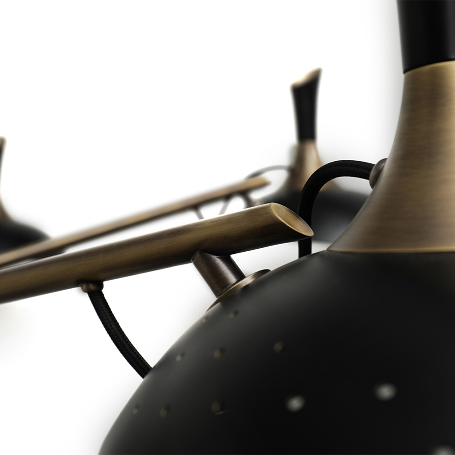 Inspired by the enigmatic life of Abbey Lincoln, this majestic pendant light will be the right lighting design choice for a dramatic dining room. A memorable piece that counts with golden finishes and black matte to give it a twist. This luxurious modern pendant lamp will be giving life and a statement to your modern home decor.