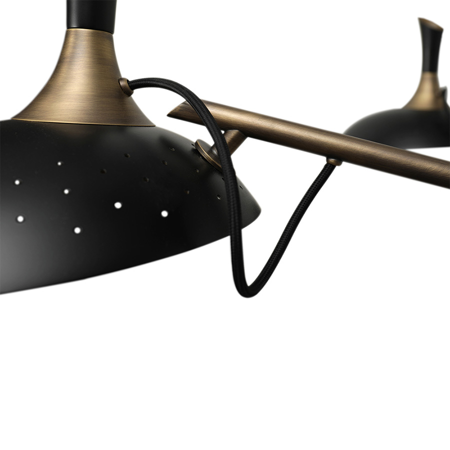 Inspired by the enigmatic life of Abbey Lincoln, this majestic pendant light will be the right lighting design choice for a dramatic dining room. A memorable piece that counts with golden finishes and black matte to give it a twist. This luxurious modern pendant lamp will be giving life and a statement to your modern home decor.