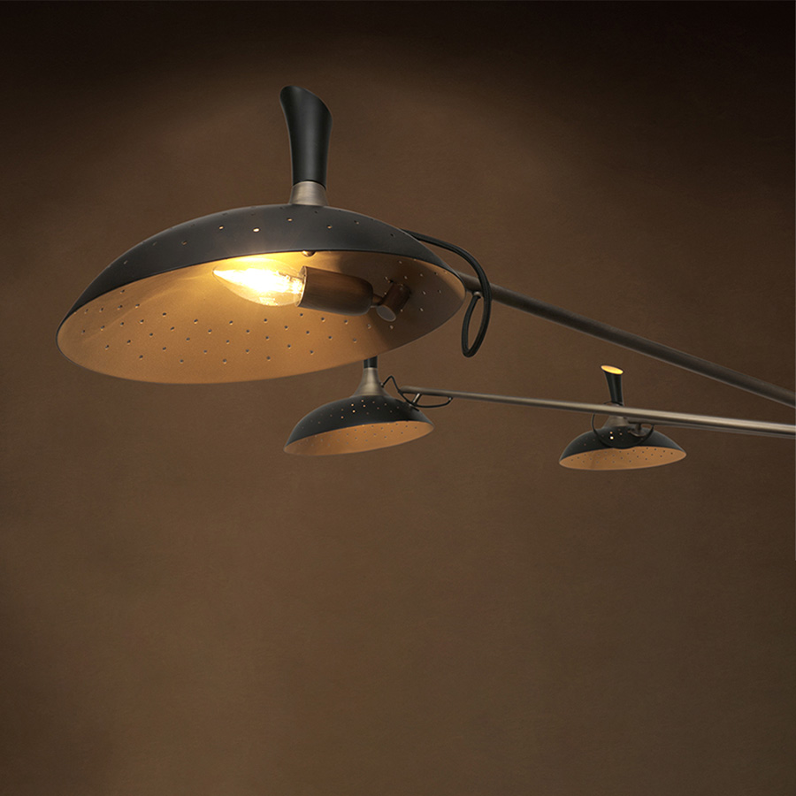 Inspired by the enigmatic life of Abbey Lincoln, this majestic pendant light will be the right lighting design choice for a dramatic dining room. A memorable piece that counts with golden finishes and black matte to give it a twist. This luxurious modern pendant lamp will be giving life and a statement to your modern home decor.