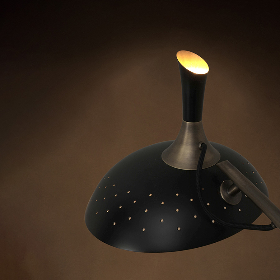Inspired by the enigmatic life of Abbey Lincoln, this majestic pendant light will be the right lighting design choice for a dramatic dining room. A memorable piece that counts with golden finishes and black matte to give it a twist. This luxurious modern pendant lamp will be giving life and a statement to your modern home decor.