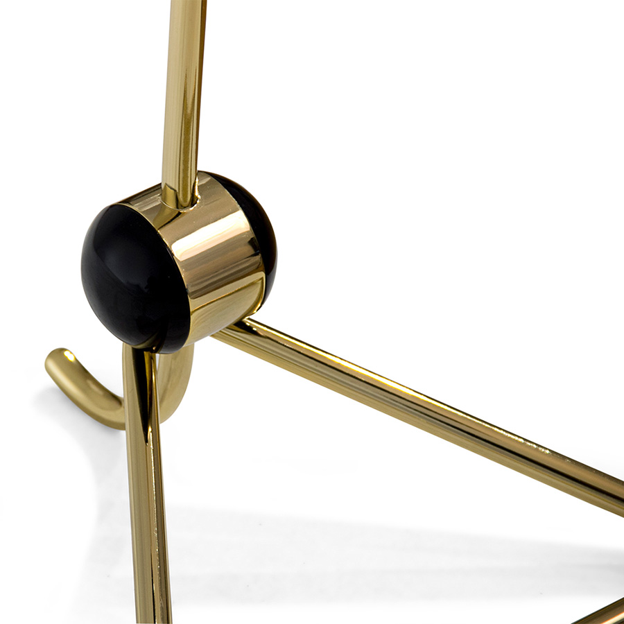 Amy vintage table lamp is a lighting design inspired by one of the greatest British singers and songwriters of all times. With a glossy black lampshade that resembles her iconic hair and a small brass detail that reminds us of her golden earring, 100% handmade in Portugal, with a gold-plated finish and a glossy black coat applied to the body, this small brass lamp is perfect for a vintage bedroom, or a retro home office.