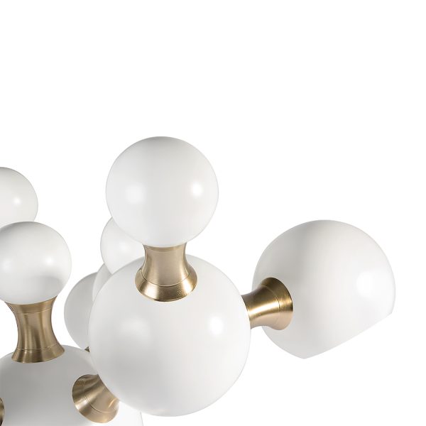 Atomic mid-century desk lamp was inspired by the molecular composition of the atom. With a body handmade in brass and steel, this large table lamp features a set of 4 round spotlights all arranged in an abstract organic composition. Weighing in at almost 20 pounds, Atomic table light has several gold-plated elements that turn it into a sophisticated option perfect for a modern home office, or a contemporary living room.
