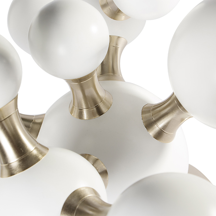 Atomic mid-century desk lamp was inspired by the molecular composition of the atom. With a body handmade in brass and steel, this large table lamp features a set of 4 round spotlights all arranged in an abstract organic composition. Weighing in at almost 20 pounds, Atomic table light has several gold-plated elements that turn it into a sophisticated option perfect for a modern home office, or a contemporary living room.
