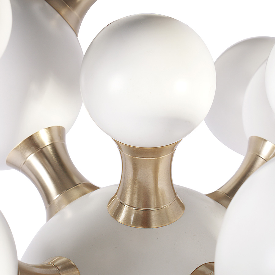 Atomic mid-century desk lamp was inspired by the molecular composition of the atom. With a body handmade in brass and steel, this large table lamp features a set of 4 round spotlights all arranged in an abstract organic composition. Weighing in at almost 20 pounds, Atomic table light has several gold-plated elements that turn it into a sophisticated option perfect for a modern home office, or a contemporary living room.