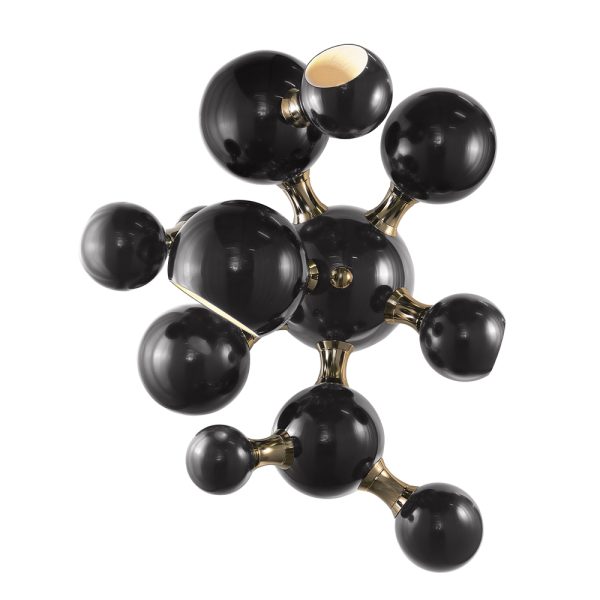 Atomic wall light is a mid-century modern lighting design inspired by the atomic discoveries of the mid-20th century. With multiple round shades that resemble the molecular composition of the atom, this interior wall light can give a fun twist to a contemporary home decor. Its body is handmade in brass and steel, with both a glossy black and a gold-plated finish.