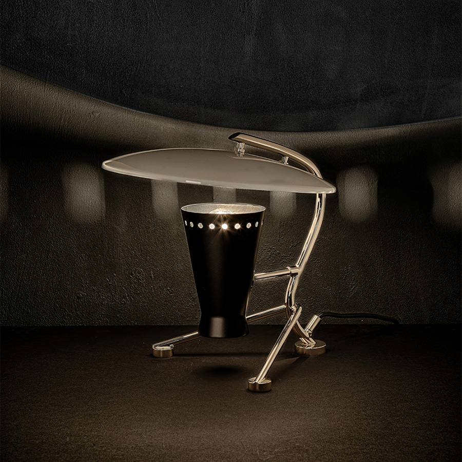 Barry mid-century desk lamp is a handmade piece produced in Portugal by some of the finest artisans in the business. This brass lighting design features a shade and a top cover made of Aluminium, top coated in matte black and matte white, which can be customized. The shade has a nickel plated finish, emphasizing the contemporaneity of this fine bedroom table lamp.