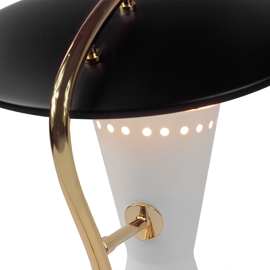 Barry mid-century desk lamp is a handmade piece produced in Portugal by some of the finest artisans in the business. This brass lighting design features a shade and a top cover made of Aluminium, top coated in matte black and matte white, which can be customized. The shade has a nickel plated finish, emphasizing the contemporaneity of this fine bedroom table lamp.