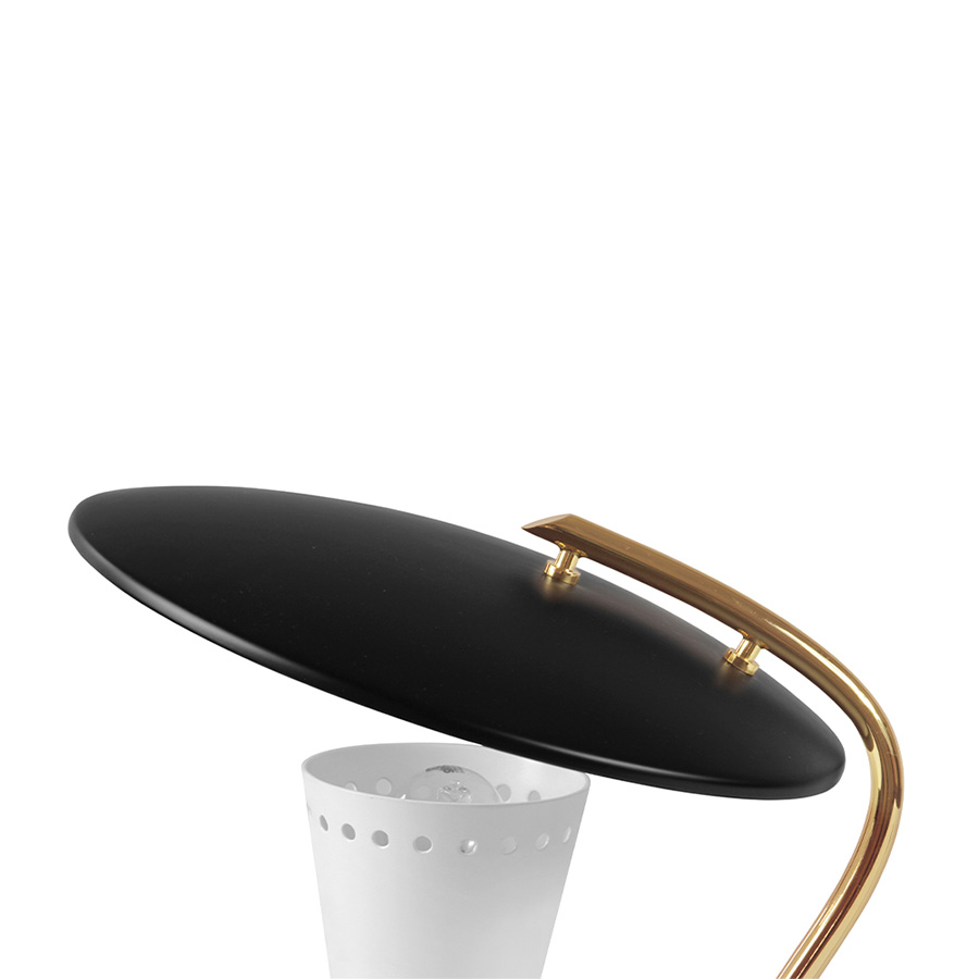 Barry mid-century desk lamp is a handmade piece produced in Portugal by some of the finest artisans in the business. This brass lighting design features a shade and a top cover made of Aluminium, top coated in matte black and matte white, which can be customized. The shade has a nickel plated finish, emphasizing the contemporaneity of this fine bedroom table lamp.