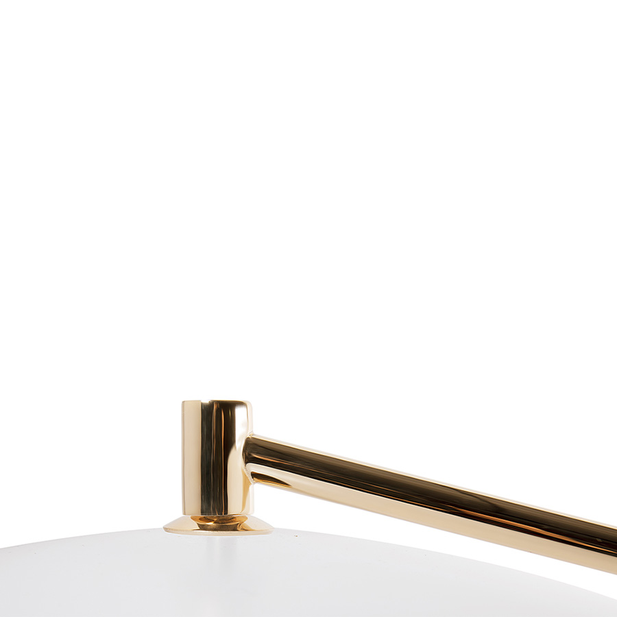 Basie table light is a vintage mid-century lamp with distinct features that make it stand out in any room setting. Handmade in brass, with an Aluminium shade and a marble base, it features a top cover that can be customized with any RAL color of your choosing. Looking its best in more formal settings, this graciously large table lamp is the perfect fit for a classic living room or entryway.