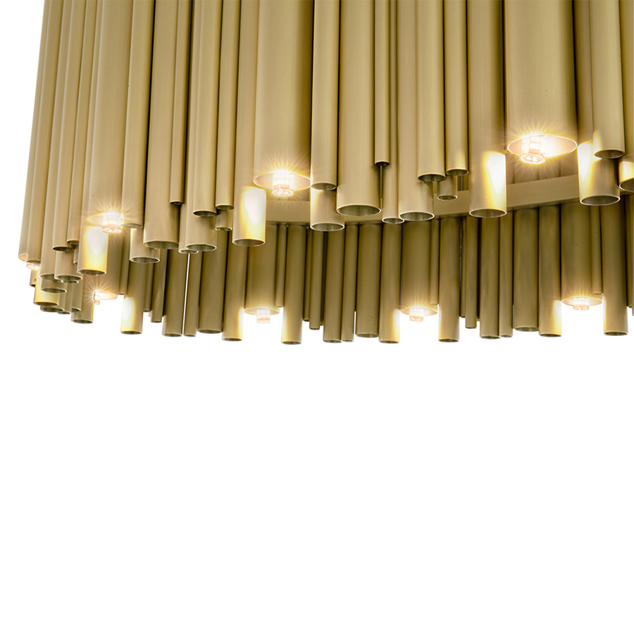 Brubeck mid-century modern chandelier is inspired by one of the foremost exponents of cool jazz: Dave Brubeck. This unique lighting design represents the sophistication and finesse of the American jazz pianist, displaying a very luxurious feeling. DelightFULL’s skilled artisans handmade this round chandelier in brass, covering it with a gold-plated finish, which can be customized in multiple other finishes.