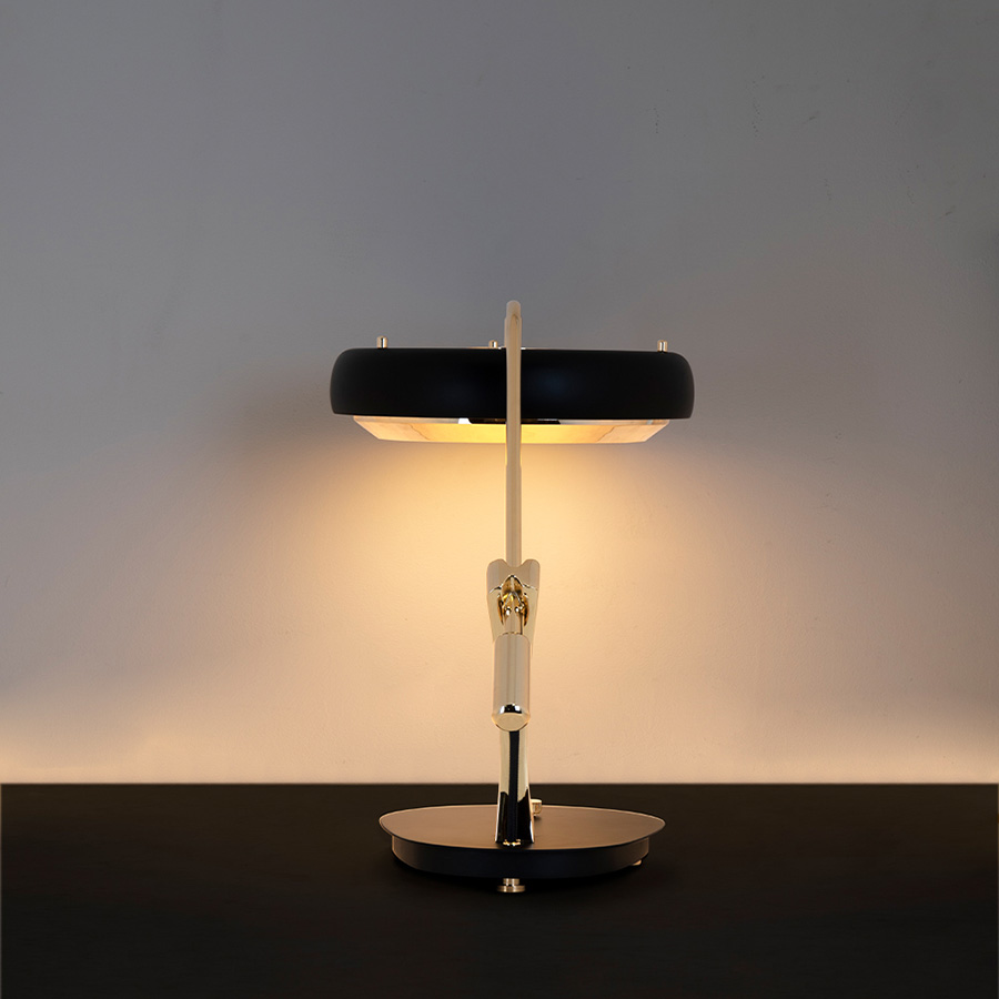 Carter desk, inspired by the icon Ron Carter is another addition to the Carter lighting family. The mid-century desk lamp has a soft casting light that will illuminate your home office design or workspace. With a stilnovo style, this mid-century desk lamp will maximize your workspace and prioritize your ambience. Perfect for a modern hotel lobby, this vintage modern desk lamp is handmade in brass, steel and aliminium with handmade detailing.