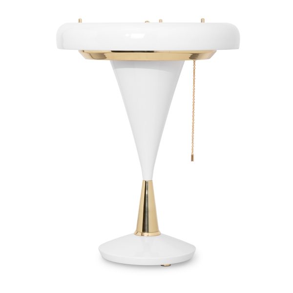 A mid-century lighting design, this iconic take on a stilnovo design has taken form of this glamorous table lamp. With a soft casting light this modern lighting fixture has all the glamour of the mid-century design iconic lines. The simple and well cut lines of this modern table lamp will fit into any luxurious decor. Handmade in brass and acrylic, this vintage modern table lamp will be the light of the room.