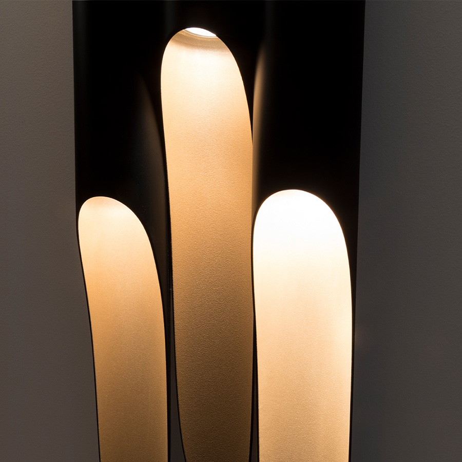 Coltrane mid-century wall sconce is inspired by the famous John Coltrane. Made from three original Coltrane lamps adjacent to one another to create a new design, this lighting piece is sure to steal the scene in your decor! Handmade in steel by DelightFULL’s skilled artisans, it is a great example of how less is more. This wall light fixture has matte black and gold powder paint finishes, which give it a more contemporary style.
