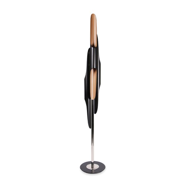 Inspired by the American jazz saxophonist and composer John Coltrane, Coltrane floor lamp embodies the avant-garde jazzy vibe that this legendary musician transmitted in every music concert. Handmade in brass and Aluminium, the minimal black floor lamp has a matte black finish on the three lamp shades with a gold powder paint on the inside, that provide a smooth lighting effect.