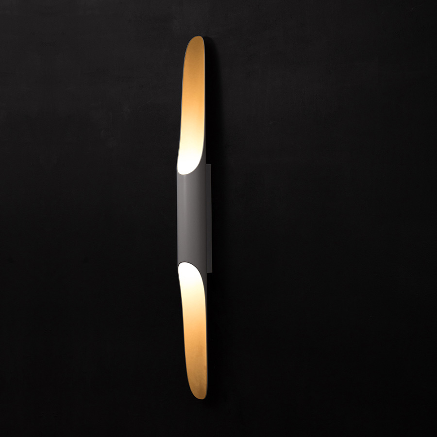 Coltrane mid-century wall sconce is inspired by the famous John Coltrane and it is the perfect piece to create a beautiful lighting effect both indoors and outdoors. Handmade in steel by DelightFULL’s skilled artisans, it is a great example of how less is more. This wall light fixture has matte black and gold powder paint finishes, which give it a more contemporary style.