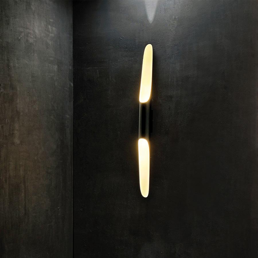 Coltrane mid-century wall sconce is inspired by the famous John Coltrane and it is the perfect piece to create a beautiful lighting effect both indoors and outdoors. Handmade in steel by DelightFULL’s skilled artisans, it is a great example of how less is more. This wall light fixture has matte black and gold powder paint finishes, which give it a more contemporary style.
