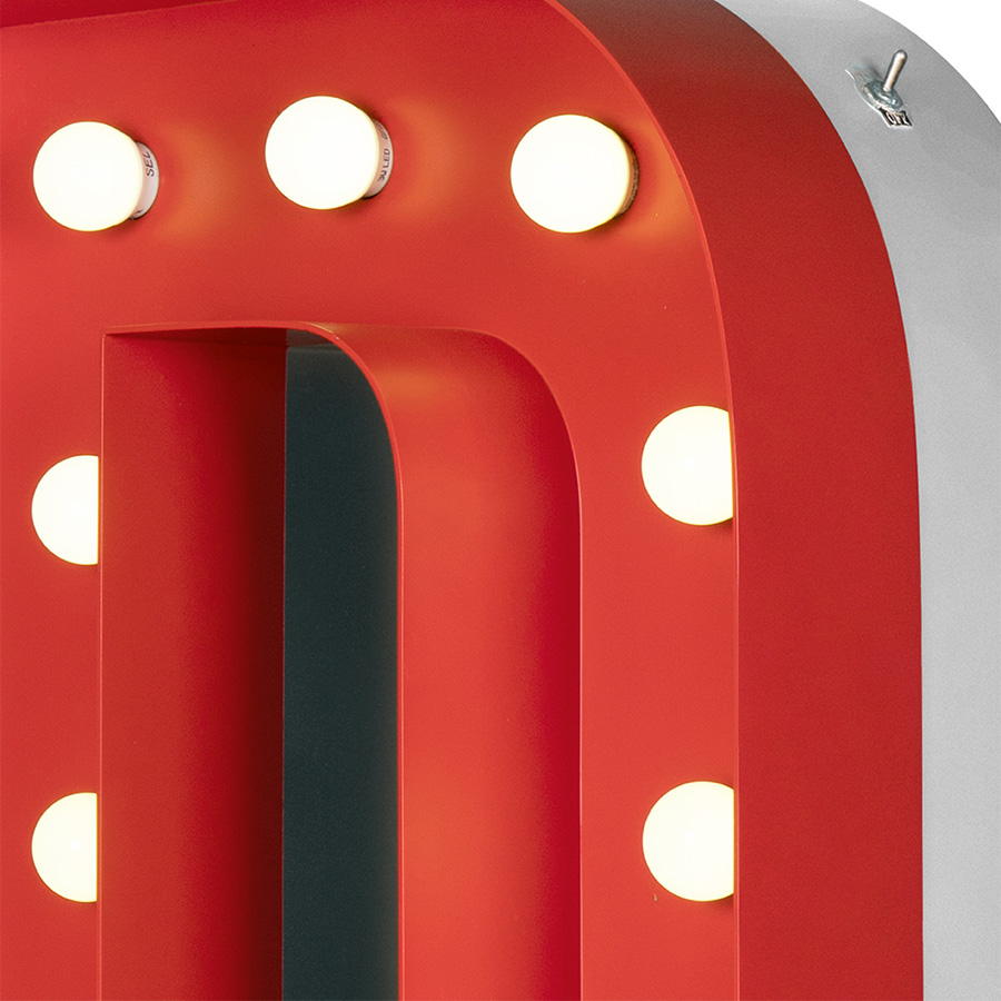 Las Vegas calling? Then you're set on the letter D. D for delight, dynamic, dreamer. Go for D if you an instant splash of the vibrant Las Vegas feeling into your modern home decor. With 16 bulbs and colour customizable, this marquee letter will take your breath away with the glamorous touch of stainless steel.