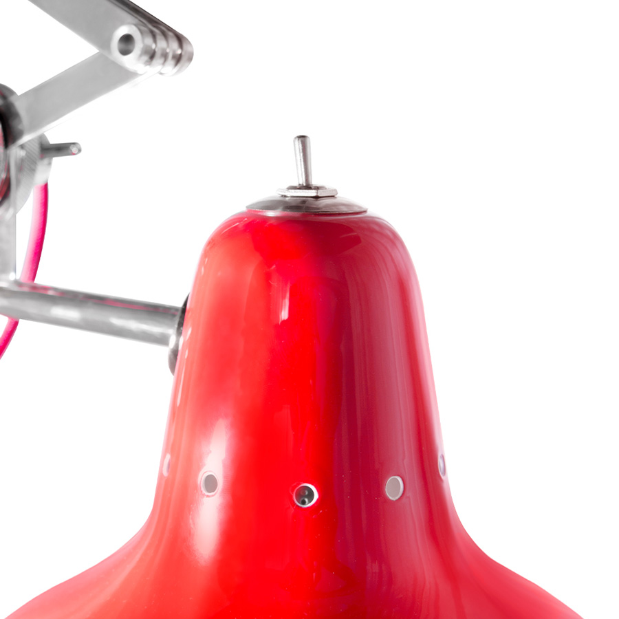 Diana pendant lamp is an industrial-inspired design that embodies all the simplicity and sophistication of the mid-century modern age. It is handmade in brass and Aluminium. The body, built out of brass has a standard black nickel plated finish, while the shade features a standard matte red lacquer on the outside. However, it can be customized using any RAL color of your choosing.