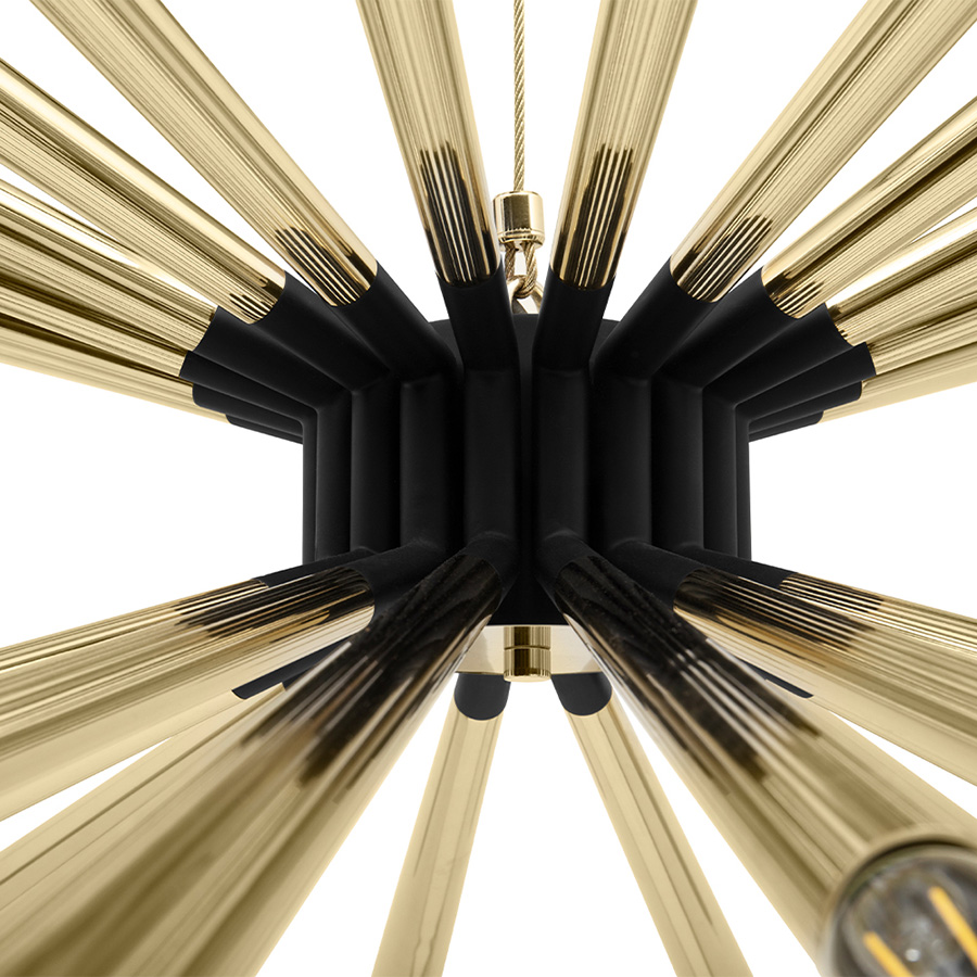 Inspired by the acclaimed jazz trumpet player Tommy Dorsey, this mid-century suspension chandelier is a unique lighting fixture that embodies the musicality of the 1950s. Allying the best of ancient techniques with the modern expertise of high- craftsmanship, Dorsey is a handmade brass chandelier, with Aluminium lamp shades.