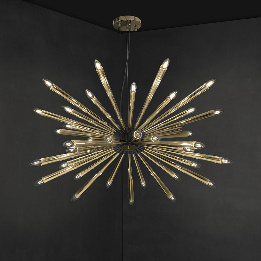 Inspired by the acclaimed jazz trumpet player Tommy Dorsey, this mid-century suspension chandelier is a unique lighting fixture that embodies the musicality of the 1950s. Allying the best of ancient techniques with the modern expertise of high- craftsmanship, Dorsey is a handmade brass chandelier, with Aluminium lamp shades.