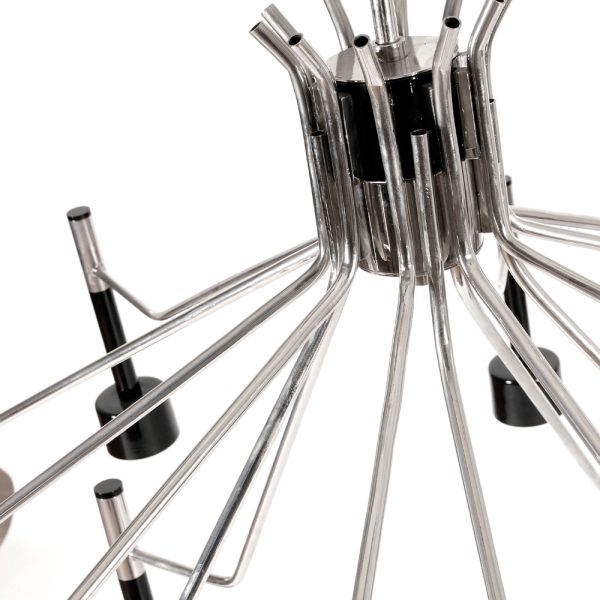 Ella round chandelier is a unique ceiling fixture which brings back the clean and sophisticated feelings of the mid-century modern era lived in the 1960’s Palm Springs. With a body 100% handmade in brass and its lampshades made of Aluminium, this lighting design was reinvented using today’s technical skills paired with the traditional craftsmanship and know-how of some of the best Portuguese artisans.