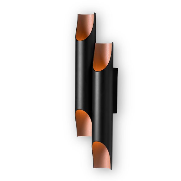 Meet Galliano, a modern wall lamp with a minimalist style that is undeniably versatile. A piece created with two original Galliano lamps adjacent to one another to create a new design that impresses. One of DelightFULL's best sellers, Galliano is made of iron with a matte black exterior and a gold powder paint interior finishing, it produces a unique lighting effect when you see light being casted thought its pipes.