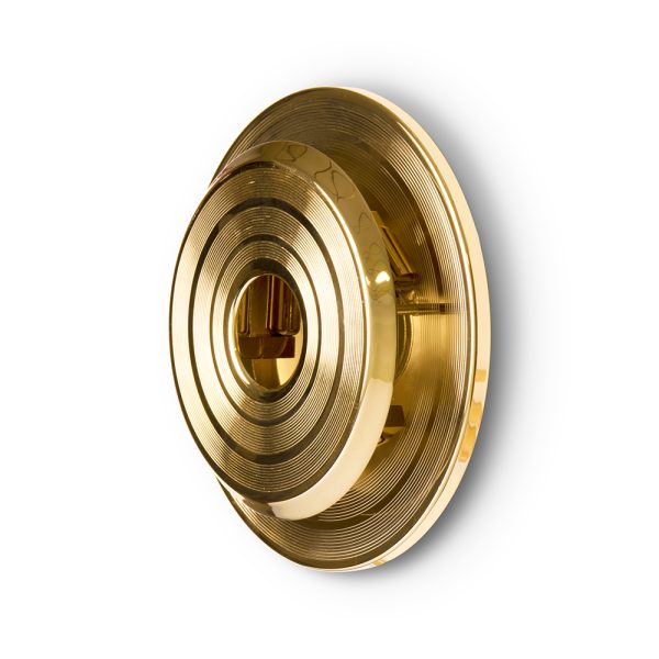 Hendrix wall sconce has a round shape that was inspired by a golden vinyl player. Ideal for every single mid-century modern interior, this wall light fixture will bring a smooth lighting effect to your room. 100% handmade in brass, Hendrix showcases a high quality craftsmanship. With a gold plated finish, this wall light has an avant-garde design perfect for modern and contemporary environments