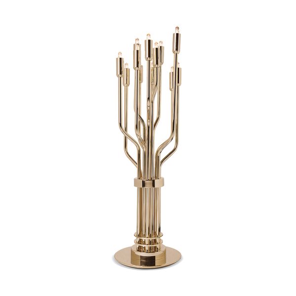 Janis is a mid-century modern table lamp inspired by one of the greatest female rock stars of the 20th century. Is a contemporary reinterpretation of the best mid-century lighting design classics. 100% handmade in brass by some of the finest artisans in Portugal, Janis has a gold-plated finish that comes to enhance its luxurious features. An unforgettable brass lighting design that sits well in a classic living room, or a modern entryway.
