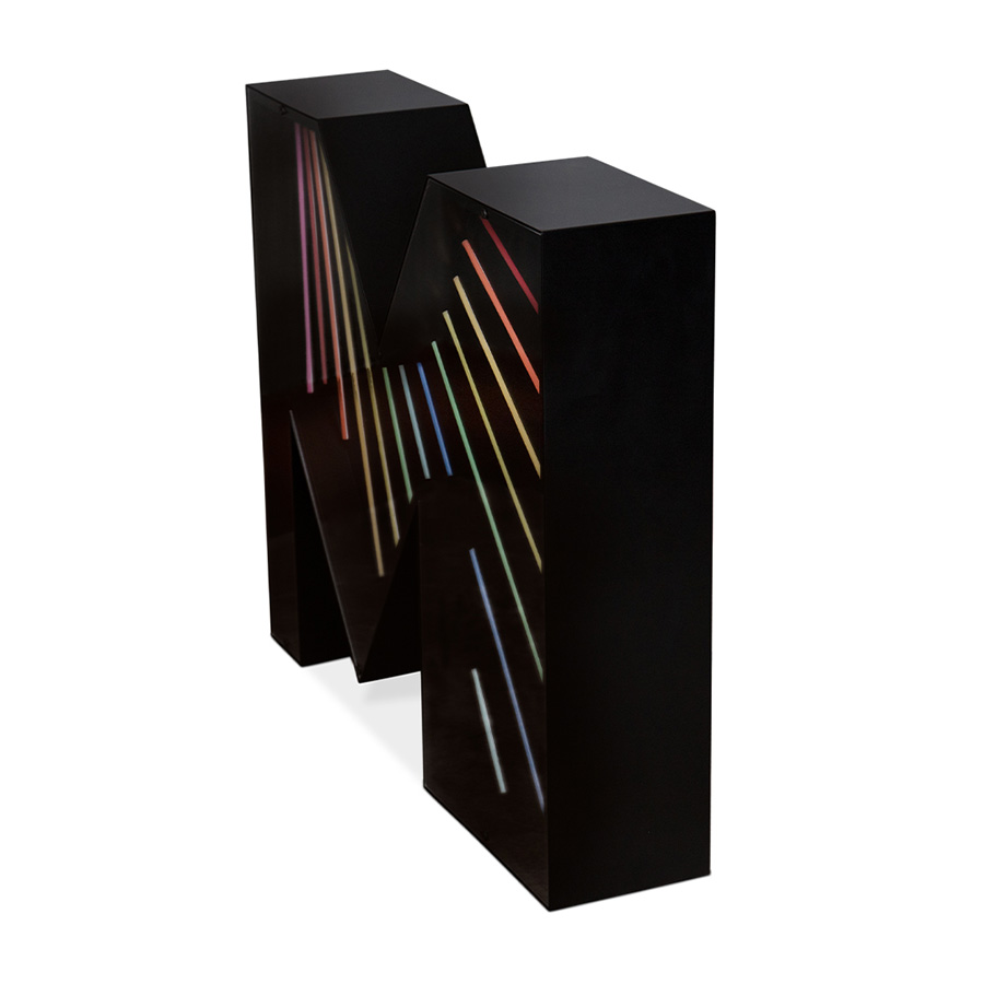 An eye-catching touch to a big, bold and bright marquee letter design. A unique way of bringing a unique, colourful and cheerful touch to any exterior or interior design project. With its stunning rainbow neon effect, this versatile lighting design can be placed in the wall or on the floor. Coming with a large anti-reflective acrylic panel to protect the neons this marquee letter design has 1 meter and its handmade in acrylic and Aluminium. Customizable on demand it's also available in a mini version, this marquee letter is perfect for a fun lobby.