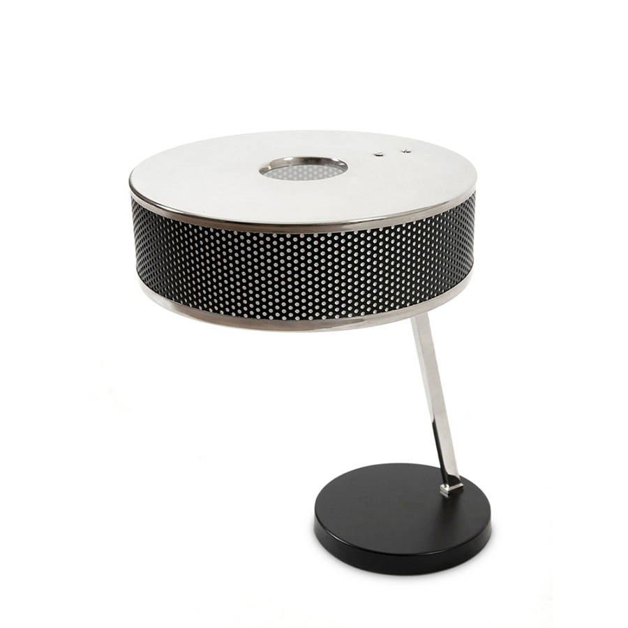 Marcus table lamp was inspired by Dieter Rams strict design philosophy and timeless aesthetic.One of DelightFULL’s most versatile pieces. The body features a nickel plated finish, while the base and the shade are built in Aluminium and lacquered a matte black to create a more neutral expression and showcase the versatility of the small table lamp.It is also a great modern desk lamp that would look incredible in a more contemporary home office.