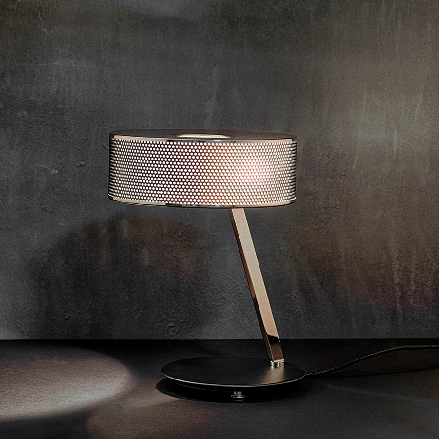 Marcus table lamp was inspired by Dieter Rams strict design philosophy and timeless aesthetic.One of DelightFULL’s most versatile pieces. The body features a nickel plated finish, while the base and the shade are built in Aluminium and lacquered a matte black to create a more neutral expression and showcase the versatility of the small table lamp.It is also a great modern desk lamp that would look incredible in a more contemporary home office.