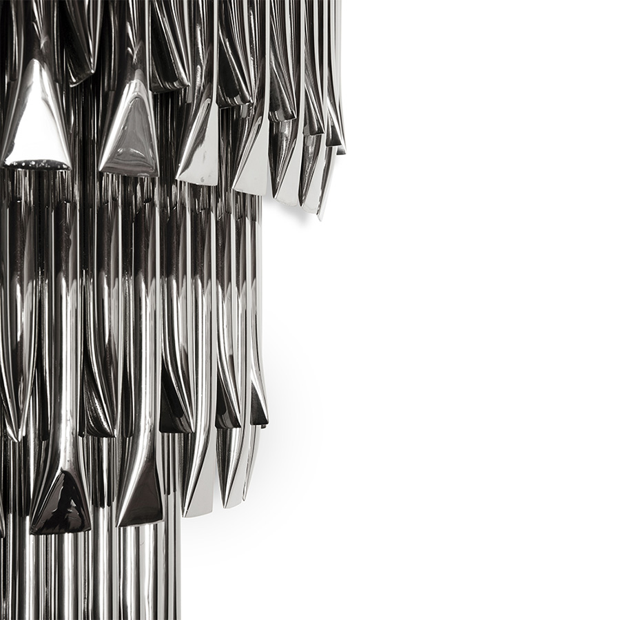 Matheny wall has a complex and attractive geometry design of combined tubes. In this variation, three of the original designs are combined on top of each other in a cascade of metal pipes to create a new impressive piece.This unique lamp combines a mid-century modern design with a classic style to make a statement. A modern wall light 100% handmade in brass with a brushed nickel finish. With 4 lamps, we recommend you to use G9 bulbs.