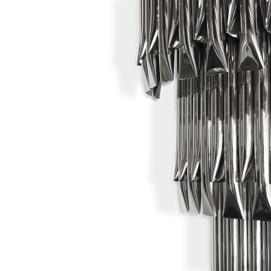 Matheny wall has a complex and attractive geometry design of combined tubes. In this variation, three of the original designs are combined on top of each other in a cascade of metal pipes to create a new impressive piece.This unique lamp combines a mid-century modern design with a classic style to make a statement. A modern wall light 100% handmade in brass with a brushed nickel finish. With 4 lamps, we recommend you to use G9 bulbs.