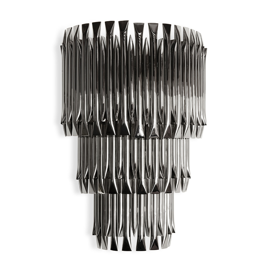 Matheny wall has a complex and attractive geometry design of combined tubes. In this variation, three of the original designs are combined on top of each other in a cascade of metal pipes to create a new impressive piece.This unique lamp combines a mid-century modern design with a classic style to make a statement. A modern wall light 100% handmade in brass with a brushed nickel finish. With 4 lamps, we recommend you to use G9 bulbs.