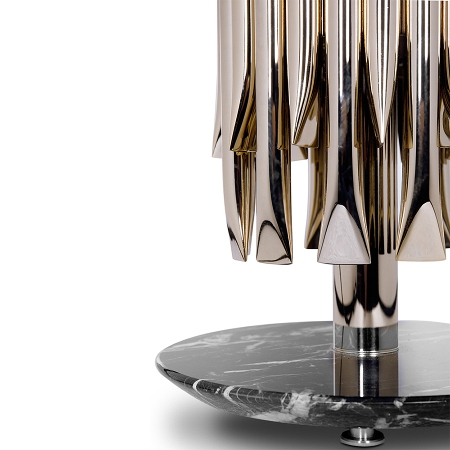 Matheny table lamp is a sleek and classic lighting design. 100% designed and produced in Portugal. Its marble base can be customized with four different types of marble to match the gold-plated finish of the body. A unique vintage brass table lamp, Matheny is a new take on the mid-century classics. It is the right table lamp for living room ambiences, but it can also be thought of as a bedside table lamp, depending on the decor of your master bedroom.