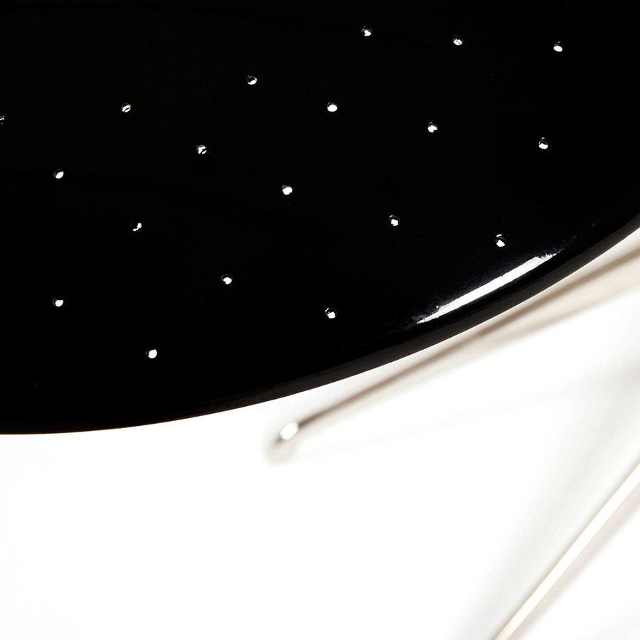 Is a design by DelightFULL that successfully showcases the merge between mid-century design and the contemporary influences of today’s world. It boasts a stunning brass body with a nickel plated finish, and an Aluminium-built shade lacquered a glossy black on the outside and a matte white on the inside, so as to not reflect the light in an uncomfortable way. An easy way to bring style into your master bedroom.