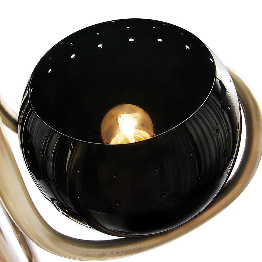 Neil floor lamp is a reminiscent lamp of the golden years of space. Around, brass base secures a black matte stem reaching up into three glossy black finished lampshades with a futuristic style. The three arms with flexible lights provide a good peripheric light range. The elegance of the continuous flowing center tubes gives a floating sensation to the whole piece, that would be perfect in a retro style living room next to a lounge chair or in a luxurious lobby.