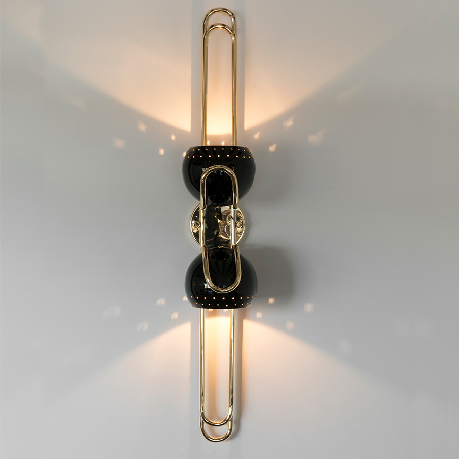 Neil wall is just the perfect piece of retro lighting design you've been waiting for. A superb piece of remembrance of the retro style designs, Neil has a modern twist to it. Its elegance and the fluidity of its shape blend perfectly into a modern home design or in a hospitality design project.