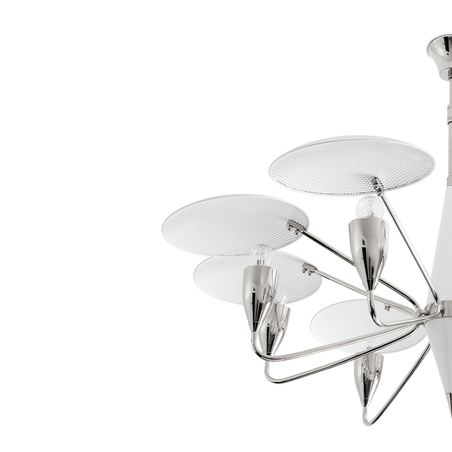Peggy modern chandelier has a 60’s feel that won’t go unnoticed. With a structure handmade in brass and with a top cover in perforated steel, this unique lamp has a nickel plated and matte white finish. The dazzling lighting design lamp shades are in matte black, making an incredible contrast with the matte white top cover, that characterizes this contemporary chandelier. With almost 18 pounds.