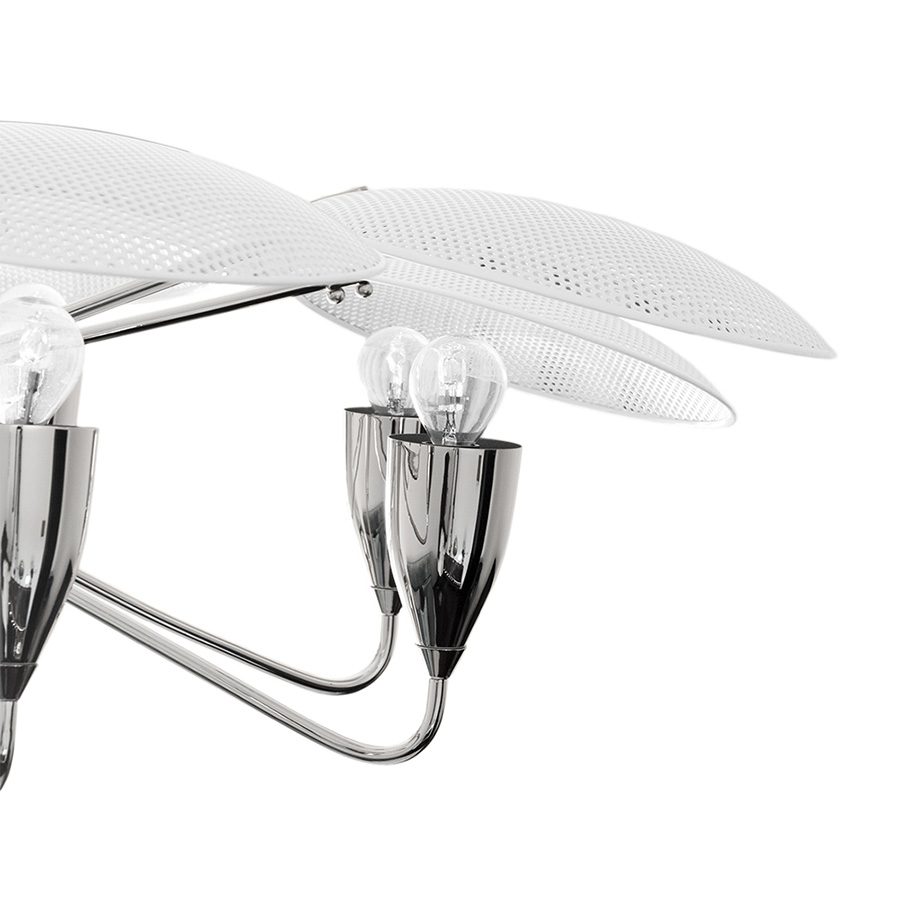 Peggy modern chandelier has a 60’s feel that won’t go unnoticed. With a structure handmade in brass and with a top cover in perforated steel, this unique lamp has a nickel plated and matte white finish. The dazzling lighting design lamp shades are in matte black, making an incredible contrast with the matte white top cover, that characterizes this contemporary chandelier. With almost 18 pounds.