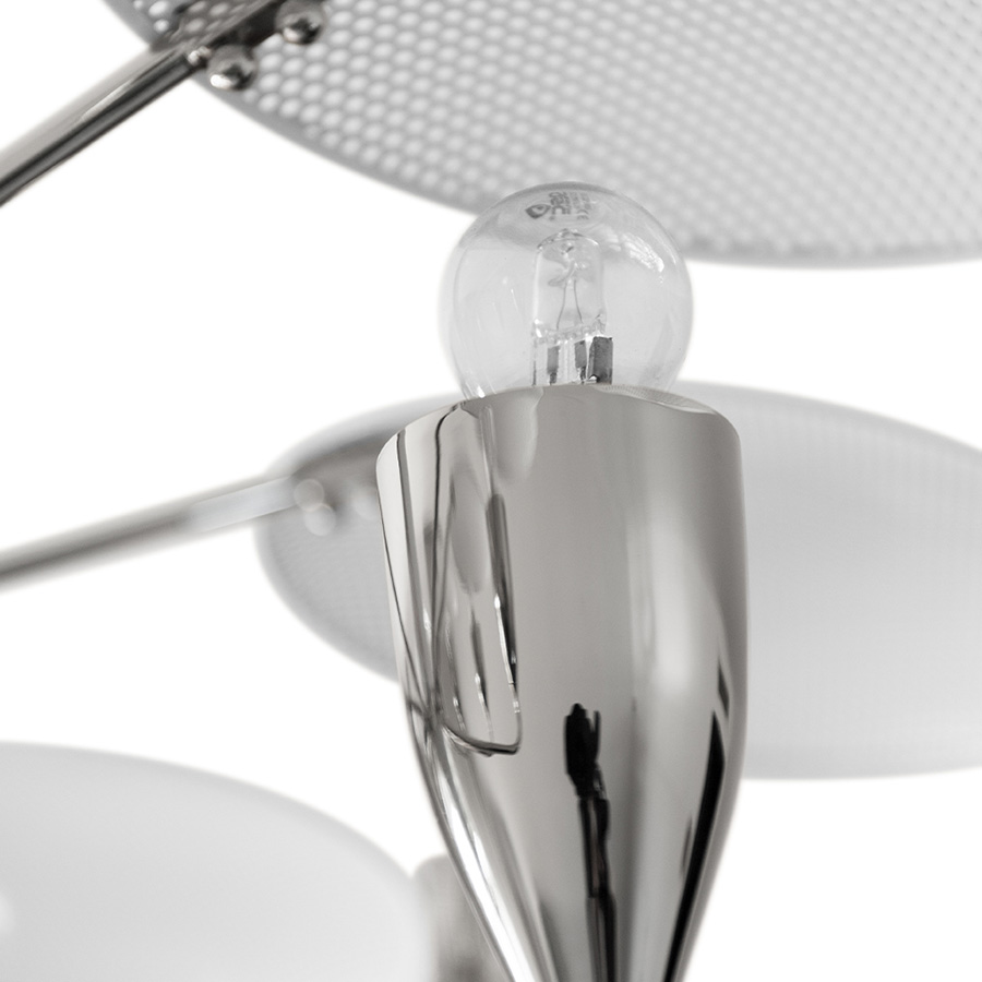 Peggy modern chandelier has a 60’s feel that won’t go unnoticed. With a structure handmade in brass and with a top cover in perforated steel, this unique lamp has a nickel plated and matte white finish. The dazzling lighting design lamp shades are in matte black, making an incredible contrast with the matte white top cover, that characterizes this contemporary chandelier. With almost 18 pounds.