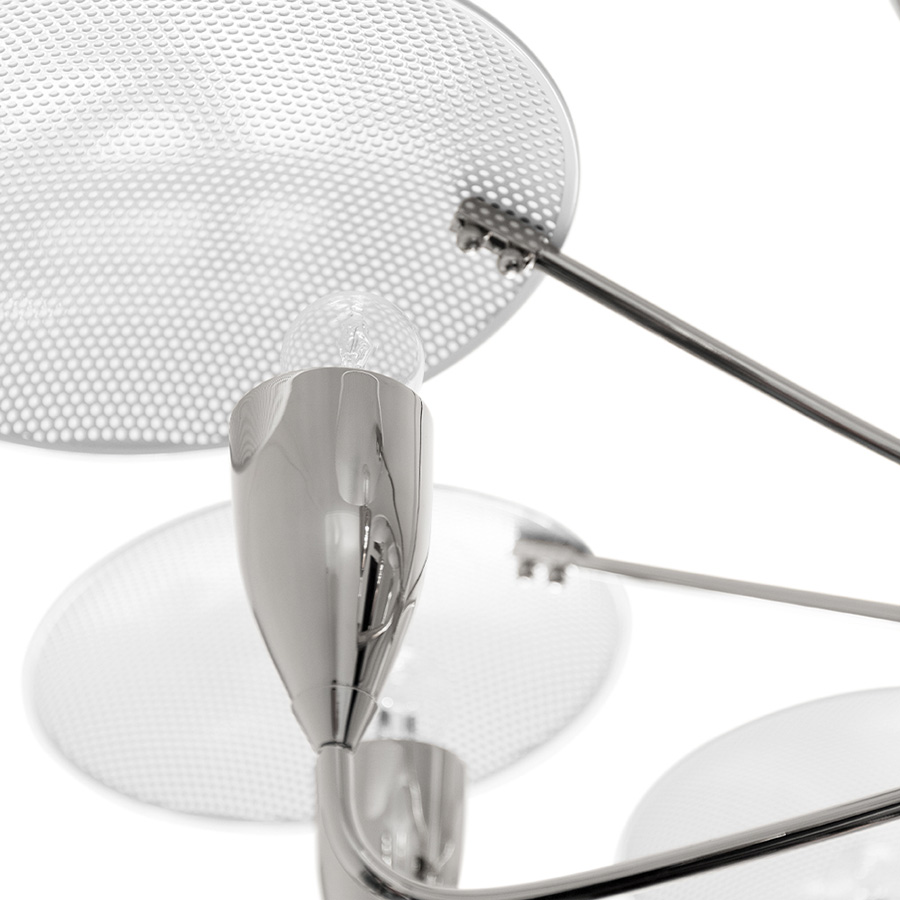 Peggy modern chandelier has a 60’s feel that won’t go unnoticed. With a structure handmade in brass and with a top cover in perforated steel, this unique lamp has a nickel plated and matte white finish. The dazzling lighting design lamp shades are in matte black, making an incredible contrast with the matte white top cover, that characterizes this contemporary chandelier. With almost 18 pounds.