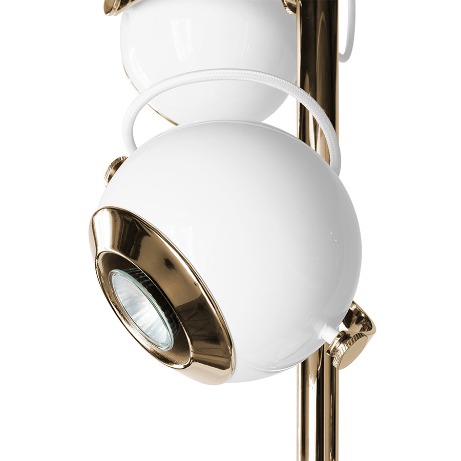 Scofield is an unusual floor lamp with five chrome lights all supported by a white brass base. Each light and bracket rotate separately allowing different light focuses. The mid-century modern floor lamp has round lamp shades in Aluminium, that can support different activities and create an industrial design in the room.