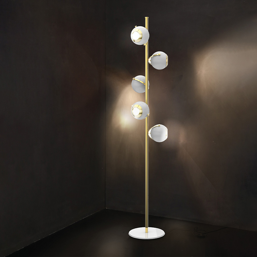 Scofield is an unusual floor lamp with five chrome lights all supported by a white brass base. Each light and bracket rotate separately allowing different light focuses. The mid-century modern floor lamp has round lamp shades in Aluminium, that can support different activities and create an industrial design in the room.