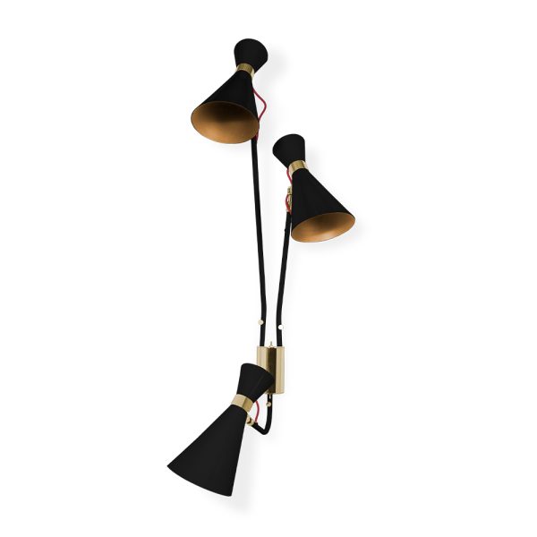 Simone wall lamp has a sleek, utilitarian design that brings a vintage flair to mid-century modern interiors. With a glossy white shade and a textile red wire, the vintage wall light fits in with a wide array of color schemes and styles. The three fully flexible arms are made of Aluminium and the structure in brass, boasting three cone lampshades with gold plated accents.