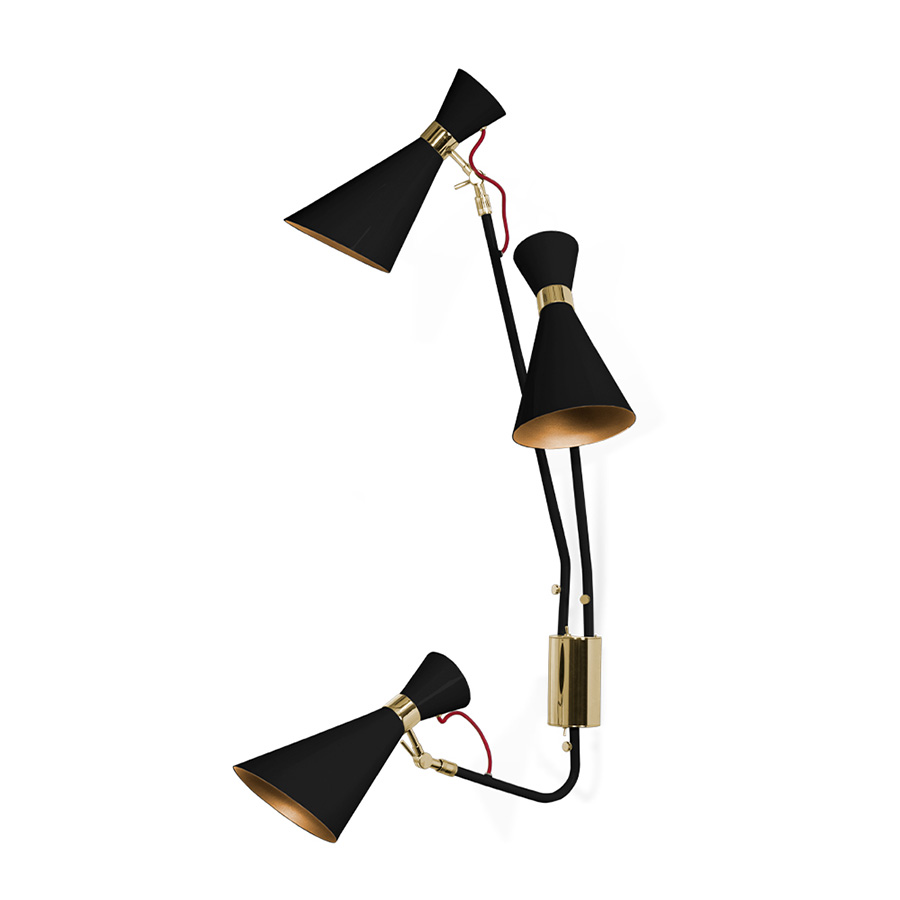 Simone wall lamp has a sleek, utilitarian design that brings a vintage flair to mid-century modern interiors. With a glossy white shade and a textile red wire, the vintage wall light fits in with a wide array of color schemes and styles. The three fully flexible arms are made of Aluminium and the structure in brass, boasting three cone lampshades with gold plated accents.