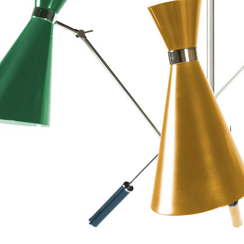 Stanley retro pendant lamp is inspired by some of the most iconic lighting designs of the 1960s. It is handmade in brass and Aluminium, with a nickel plated finish on the body, and glossy black lacquer on the outer part of lampshades. The inside is lacquered a matte white. With three changeable arms, this mid-century modern lighting fixture has three counterweights all built of iron.