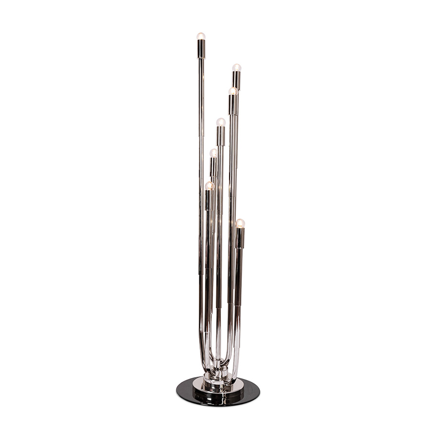 Stardust floor lamp is a mid-century modern revolving lamp that was inspired by the cosmic orbits. The main goal of this lighting design is to light up your mid-century modern home just like the stars do it at night. Constructed out of brass tubing into a rounded oblong shape, this modern floor lamp will shine brightly due to the light cast by the bulbs arranged in the same way as a candelabra.