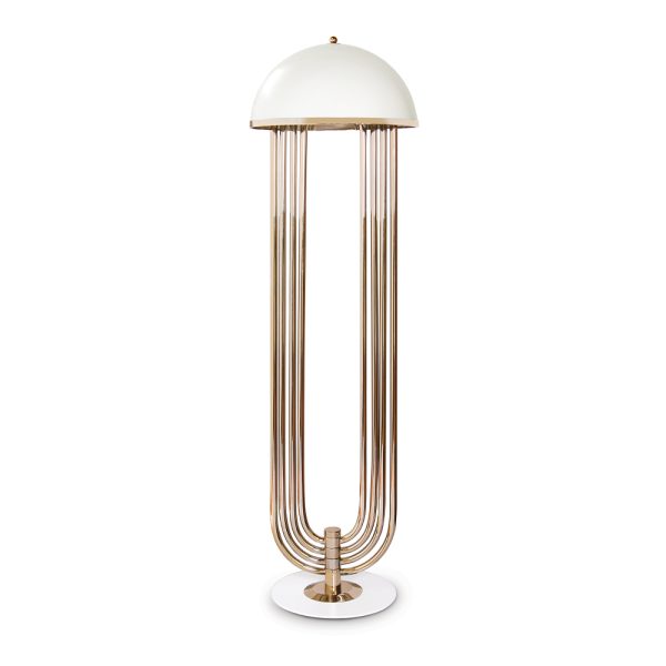 Turner floor lamp was inspired by Tina Turner’s electrifying dance moves. Ideal for any hotel design project, this art deco floor lamp will fit perfectly in a modern lobby entrance or next to a mid-century lounge chair. This mid-century floor lamp has five large arcs made of brass and a semi-spherical top cover of Aluminium lacquered in glossy white or any other RAL color of your choosing.